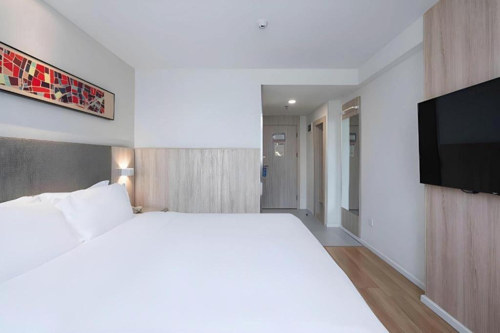 Hanting Hotel Guangzhou Sanyuanli Metro Station Экстерьер фото
